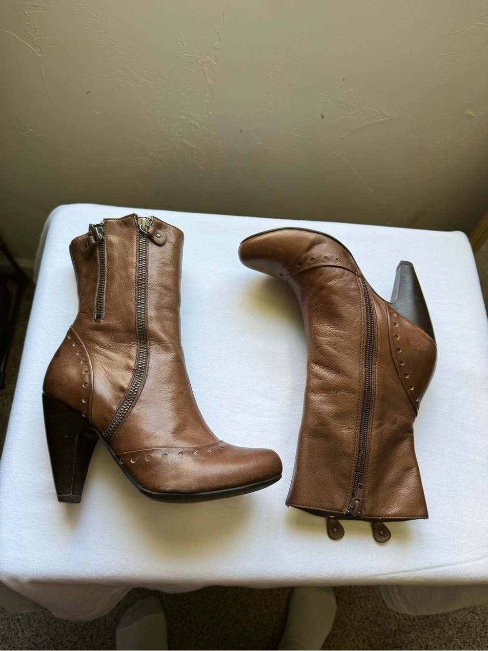 Brown Leather heeled boots with brogue detailing and double side zippers 7